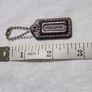 Coach XS Dark Brown Leather Hangtag
